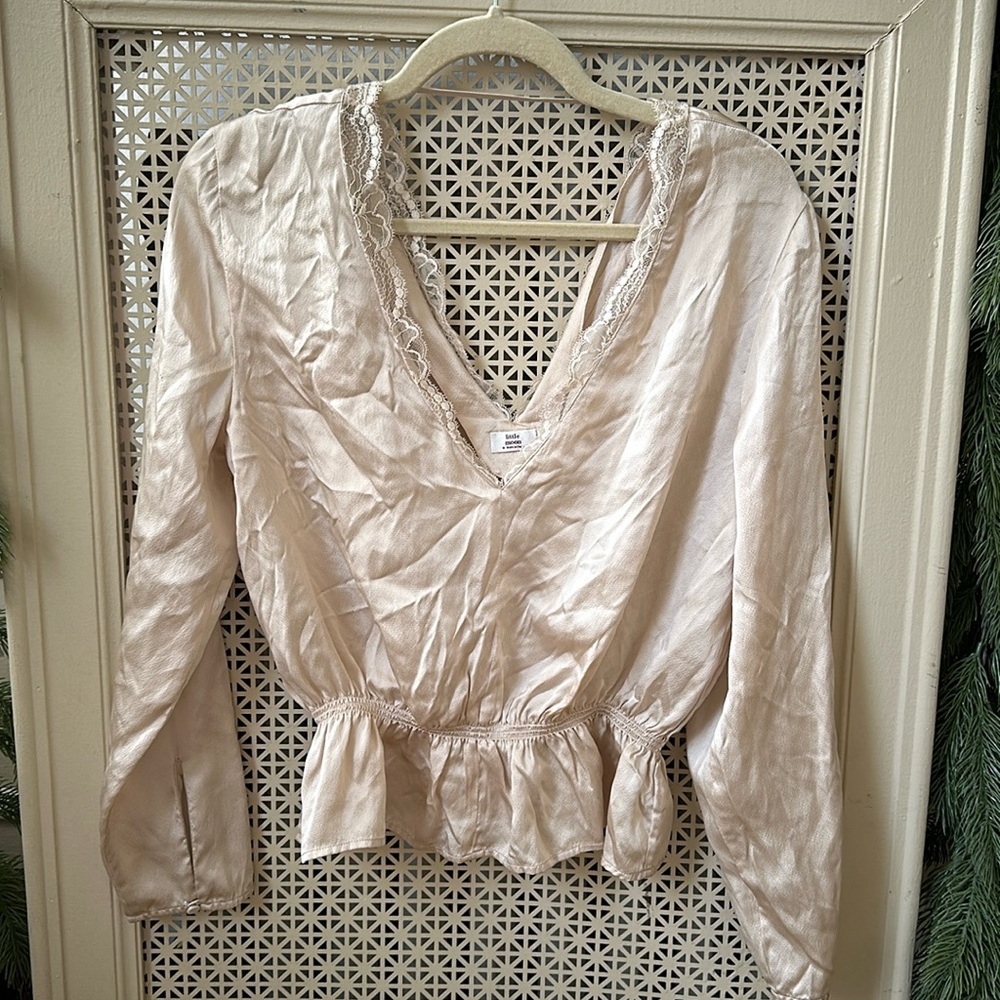 Aritzia peplum blouse with lace trim